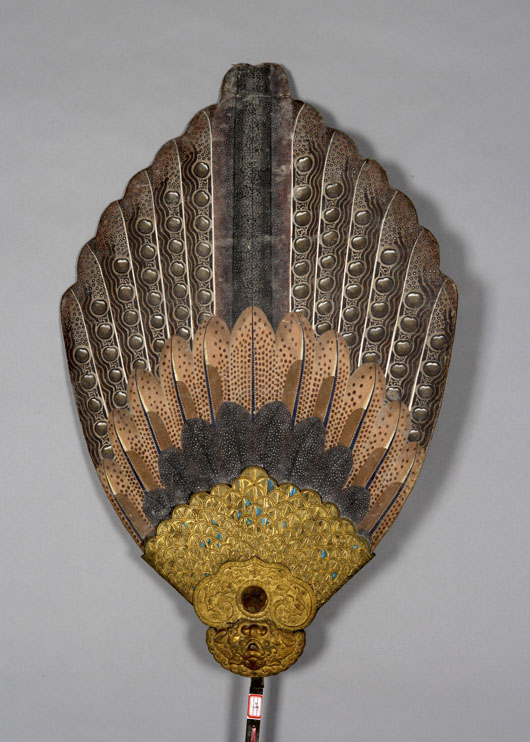 One of a pair of court fans, from Yanghe Jingshe, wood, brass, and paint, 38 3/4 inches x 25 1/4 inches; pole 70 inches long. Image courtesy of the Metropolitan Museum of Art and the Palace Museum, Beijing.
